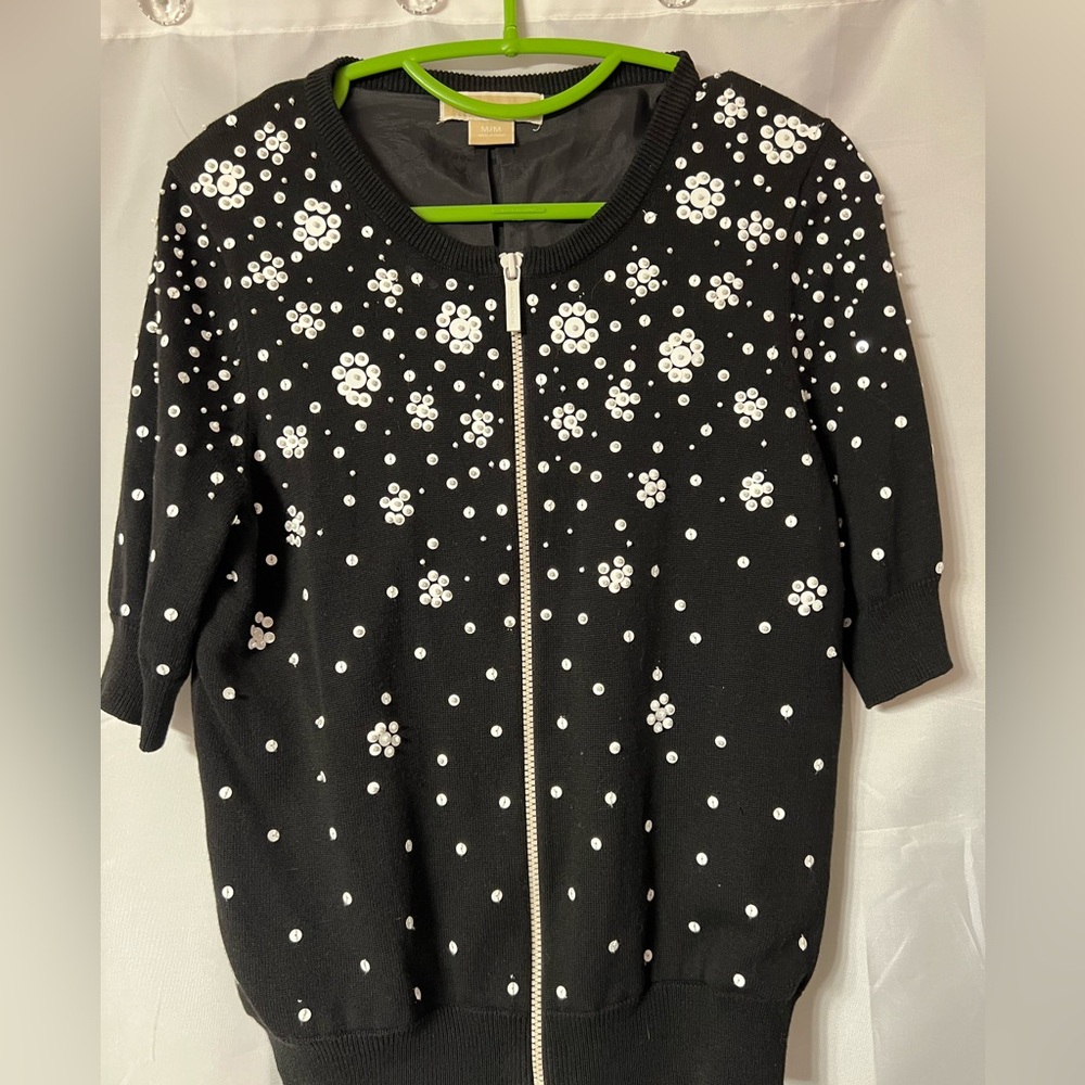 Michael Kors zip up top with sequins floral pattern black with white. Size M